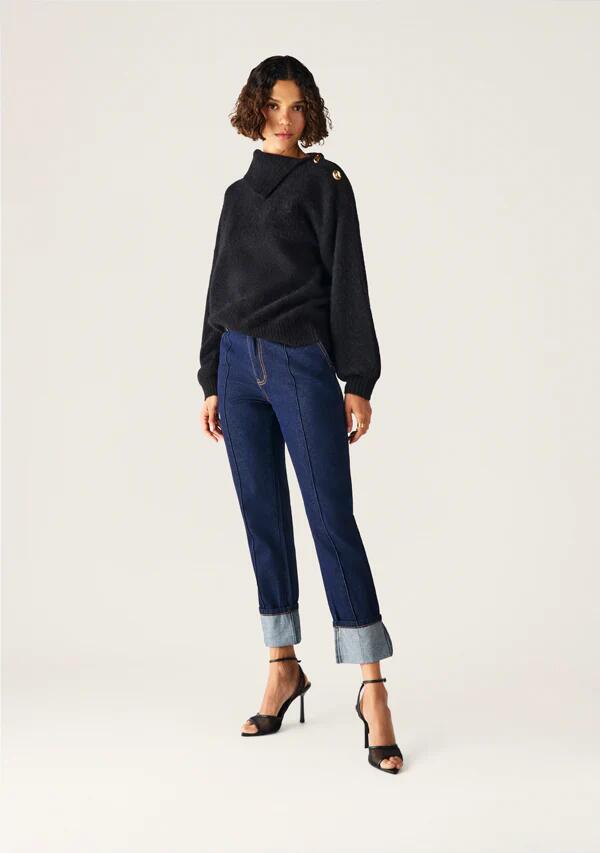 Image of a model wearing Outerwear. Productname: Vivienne Knit Jumper in Black colour by brand - MOS The Label