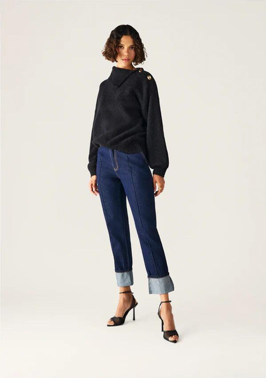 Image of a model wearing Outerwear. Productname: Vivienne Knit Jumper in Black colour by brand - MOS The Label