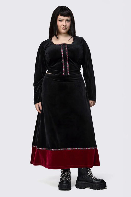 Image of a model wearing Skirts. Product name - Curve Squire Goth Velour Midi Skirt in Black colour by brand - Black Friday