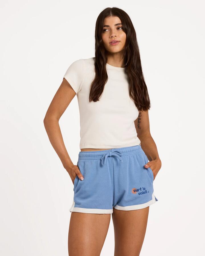 Image of a model wearing Shorts. Product name - Billabong Womens Surf Le Soleil Elastic Waist Shorts Blue Horizon in Blue Horizon colour by brand - Billabong