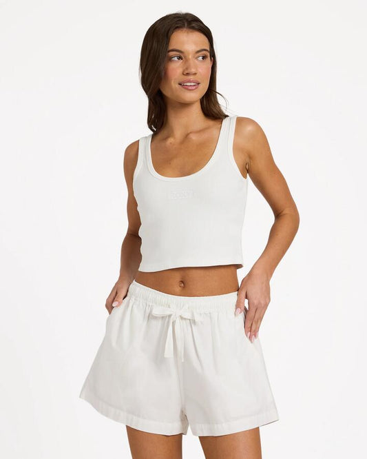 Image of a model wearing Tops. Product name - Roxy Womens All You Need Tank Top White in White colour by brand - Roxy