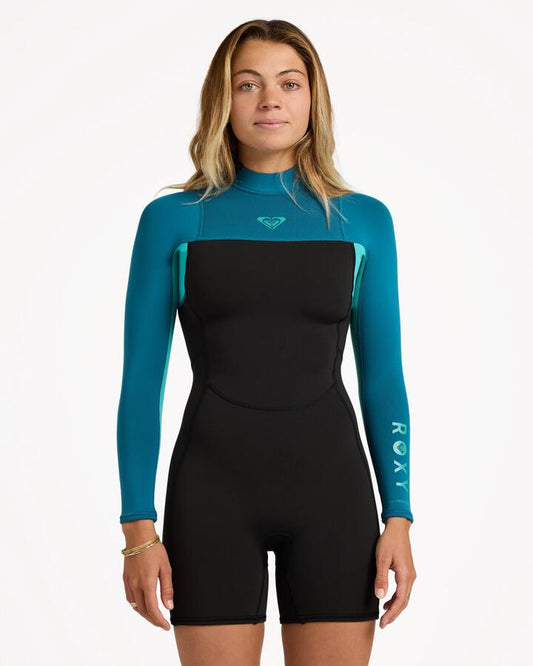 Image of a model wearing Tops. Product name - Roxy Womens Long Sleeve 2/2 Prologue Springsuit Baltic in Baltic colour by brand - Roxy