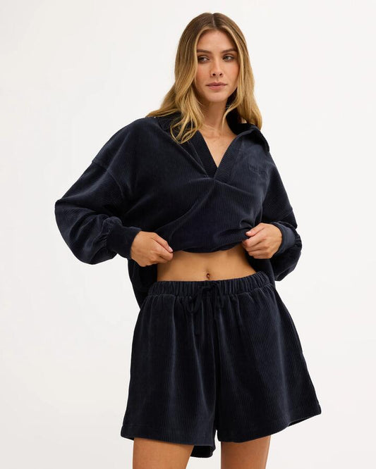 Image of a model wearing Shorts. Product name - Billabong Womens Good Day 2 Elastic Waist Shorts True Navy in True Navy colour by brand - Billabong
