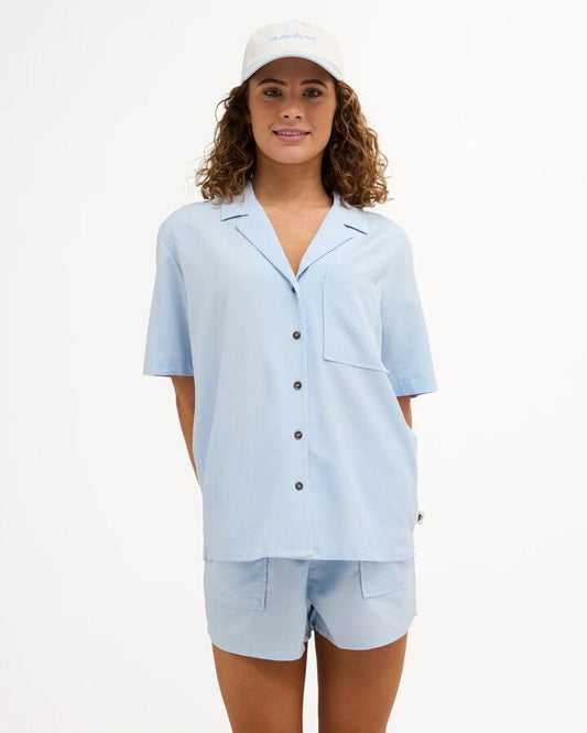 Image of a model wearing Tops. Product name - Quiksilver Womens Serene Short Sleeve Shirt Coffee Bean in Coffee Bean colour by brand - Quiksilver