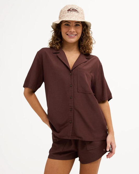 Image of a model wearing Tops. Product name - Quiksilver Womens Serene Short Sleeve Shirt Skyway in Skyway colour by brand - Quiksilver