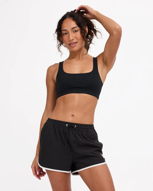 Image of a model wearing Shorts. Product name - Rvca Womens Rvca Soft Shorts Rvca Black in Rvca Black colour by brand - Rvca