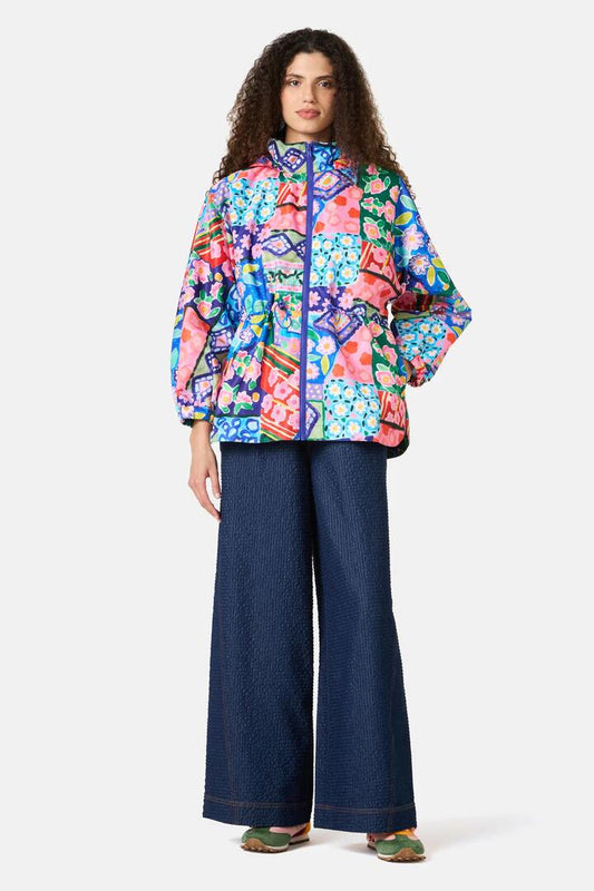Image of a model wearing Rain Coats. Product name - Emporium Raincoat in Print colour by brand - Gorman