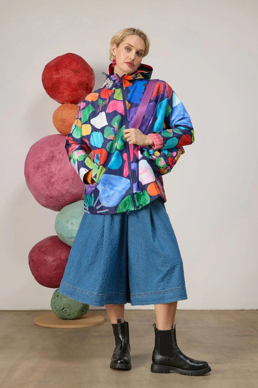 Image of a model wearing Rain Coats. Product name - Jumble Raincoat in Print colour by brand - Gorman