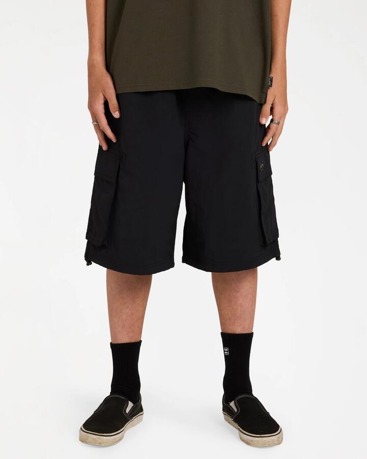 Image of a model wearing Shorts. Product name - Billabong Mens Spec 73 Cargo Shorts Black in Black colour by brand - Billabong