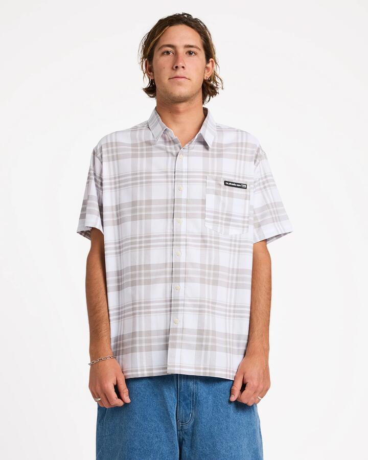 Image of a model wearing Tops. Product name - Quiksilver Mens Campaign Short Sleeve Shirt Bone White in Bone White colour by brand - Quiksilver