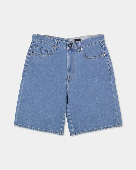 Image of a model wearing Shorts. Product name - Volcom Youth Billow Denim Short Cali Blue in Cali Blue colour by brand - Volcom