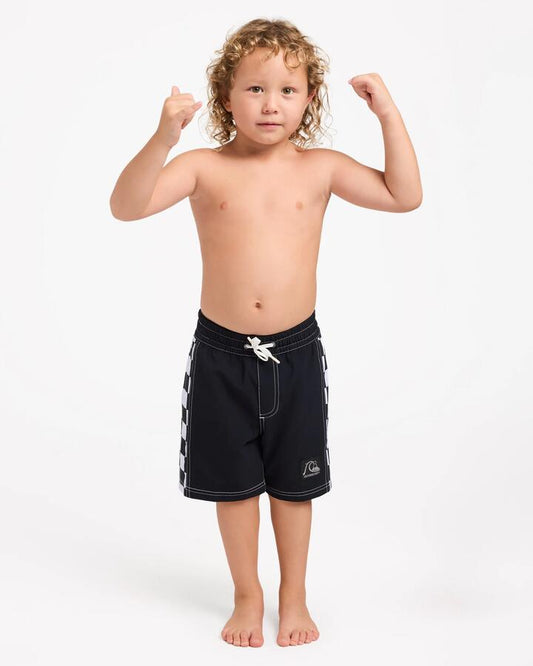 Image of a model wearing Shorts. Product name - Quiksilver Boys 2-7 Original Arch 13" Volley Shorts Black in Black colour by brand - Quiksilver