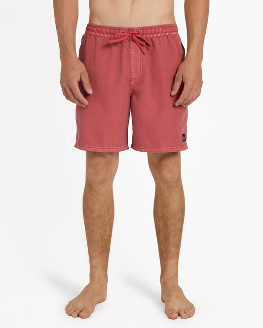 Image of a model wearing Shorts. Product name - Quiksilver Mens Everyday Surfwash 17" Volley Shorts Mineral Red in Mineral Red colour by brand - Quiksilver