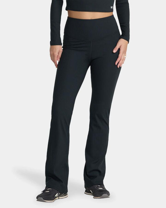 Image of a model wearing Pants. Product name - Rvca Womens Va Bootcut Leggings Rvca Black in Rvca Black colour by brand - Rvca