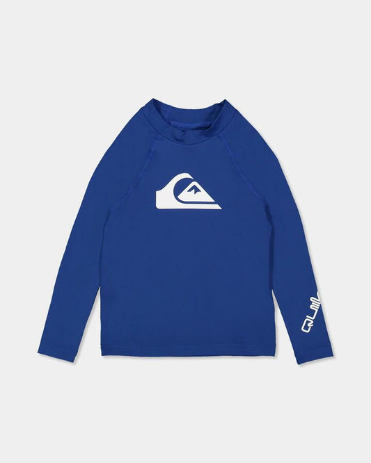 Image of a model wearing Tops. Product name - Quiksilver Boys 2-7 All Time Long Sleeve Rash Vest Monaco Blue in Monaco Blue colour by brand - Quiksilver