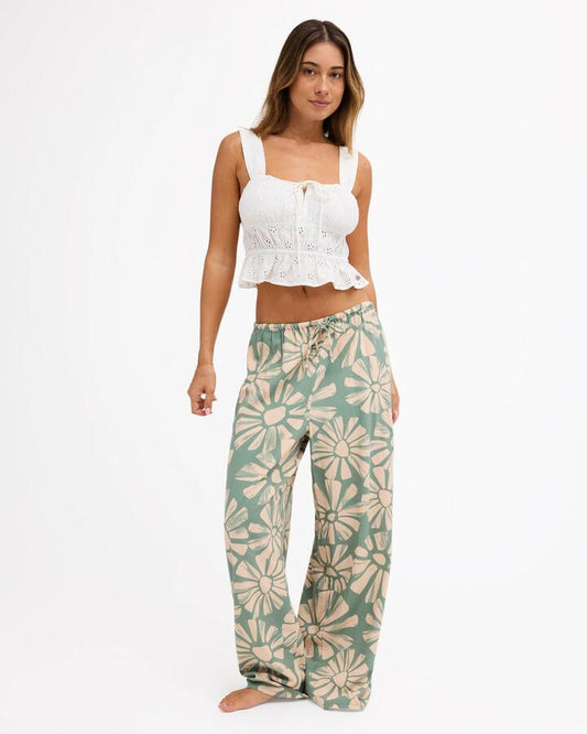 Image of a model wearing Pants. Product name - Roxy Womens Suntribe Pants Matcha in Matcha colour by brand - Roxy