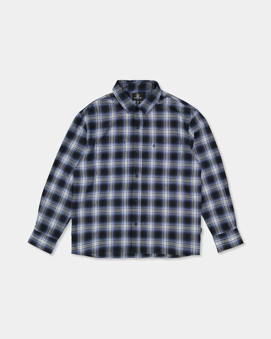 Image of a model wearing Tops. Product name - Volcom Mens Psycho Flannel Long Sleeve T-Shirt Light Navy in Light Navy colour by brand - Volcom
