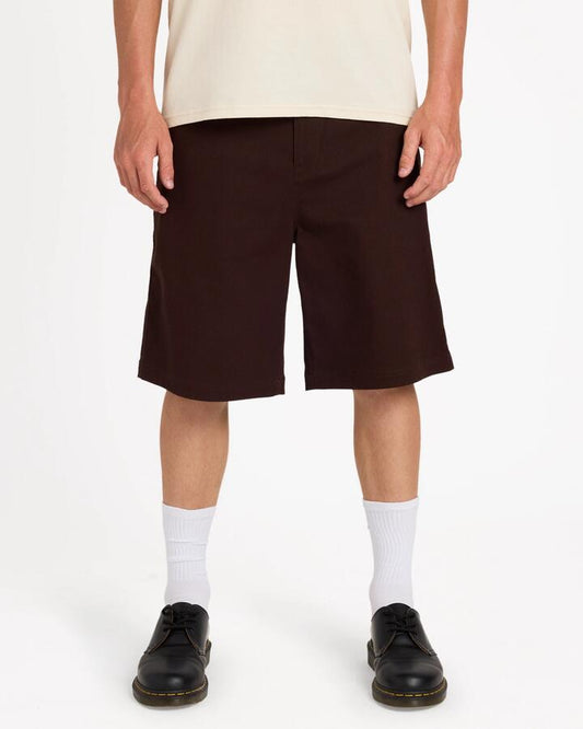 Image of a model wearing Shorts. Product name - Volcom Mens Billow Chino Shorts Cacao in Cacao colour by brand - Volcom