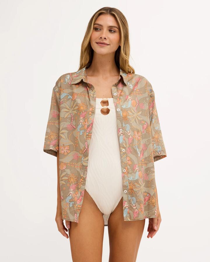 Image of a model wearing Tops. Product name - Billabong Womens Lost In Paradise Short Sleeve Shirt Seagrass in Seagrass colour by brand - Billabong