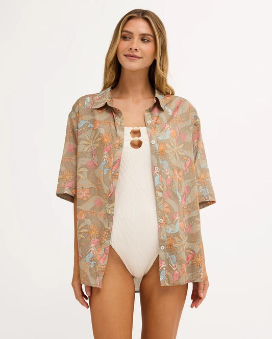 Image of a model wearing Tops. Product name - Billabong Womens Lost In Paradise Short Sleeve Shirt Seagrass in Seagrass colour by brand - Billabong