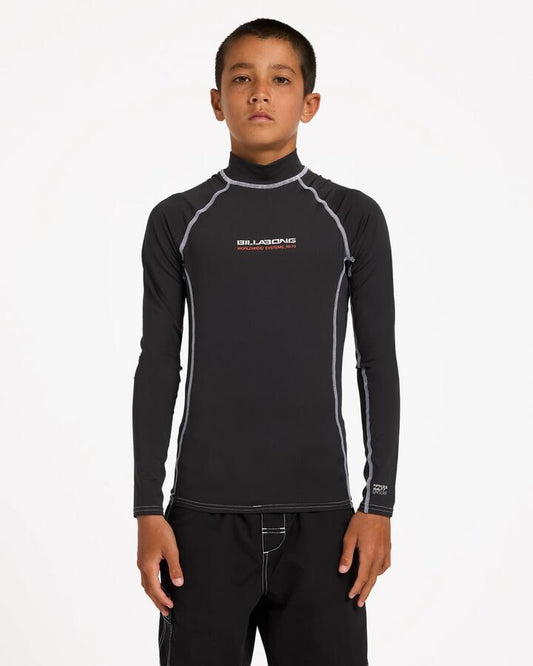 Image of a model wearing Tops. Product name - Billabong Boys 8-16 Boys Spec 73 Pf Long Sleeve Rash Vest Washed Black in Washed Black colour by brand - Billabong