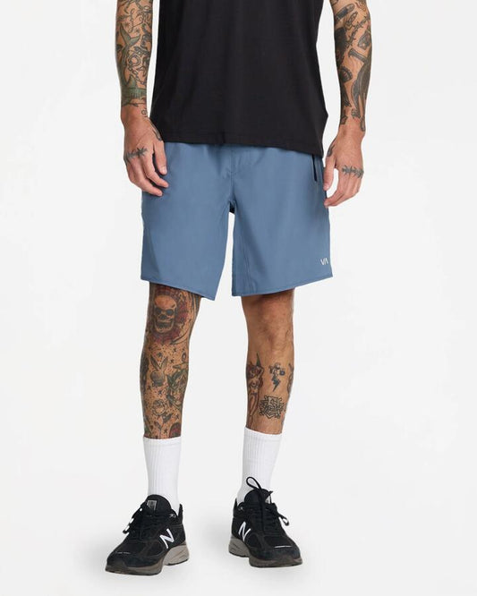 Image of a model wearing Shorts. Product name - Rvca Mens Yogger Stretch 17" Sports Shorts Vintage Navy in Vintage Navy colour by brand - Rvca