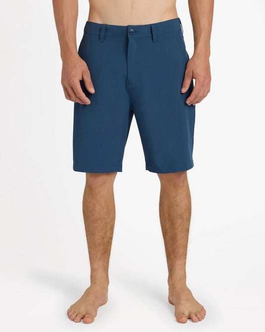 Image of a model wearing Shorts. Product name - Quiksilver Mens Union Amphibian 20" Hybrid Shorts Dark Denim in Dark Denim colour by brand - Quiksilver