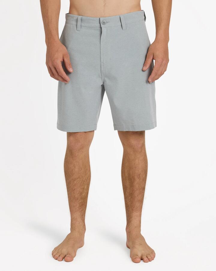 Image of a model wearing Shorts. Product name - Quiksilver Mens Union Heather Amph 19" Hybrid Shorts Quarry Heather in Quarry Heather colour by brand - Quiksilver