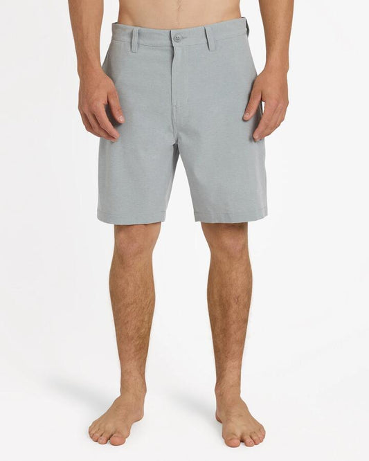 Image of a model wearing Shorts. Product name - Quiksilver Mens Union Heather Amph 19" Hybrid Shorts Quarry Heather in Quarry Heather colour by brand - Quiksilver