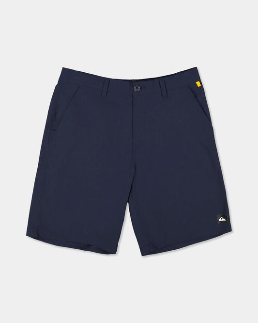 Image of a model wearing Shorts. Product name - Quiksilver Mens Overcast Amphibian 20" Hybrid Shorts Dark Navy in Dark Navy colour by brand - Quiksilver