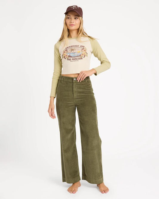 Image of a model wearing Pants. Product name - Billabong Womens Palmy Cord Pants Canteen in Canteen colour by brand - Billabong