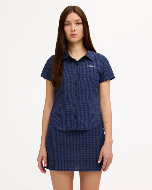 Image of a model wearing Skirts. Product name - Volcom Womens Macey Mini Skirt Blue in Blue colour by brand - Volcom