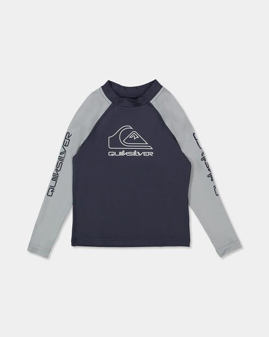 Image of a model wearing Tops. Product name - Quiksilver Boys 2-7 On Tour Long Sleeve Rash Vest India Ink in India Ink colour by brand - Quiksilver