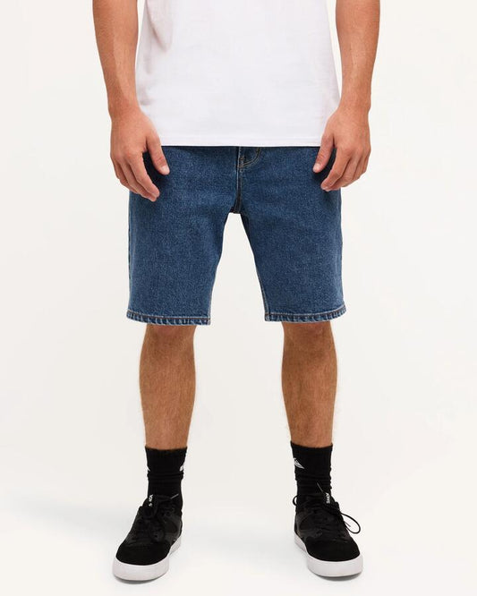 Image of a model wearing Shorts. Product name - Quiksilver Mens Aqua Cult Denim Shorts Aged in Aged colour by brand - Quiksilver
