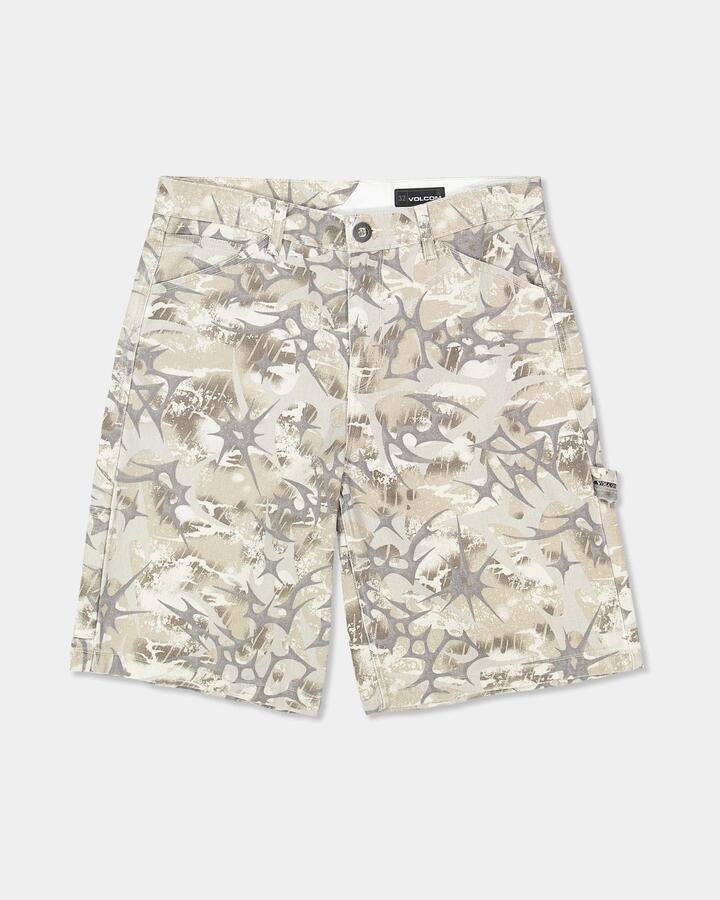 Image of a model wearing Shorts. Product name - Volcom Mens Stonemill Denim Shorts Camouflage in Camouflage colour by brand - Volcom