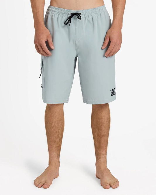 Image of a model wearing Shorts. Product name - Quiksilver Mens Exhibit 21" Volley Shorts Quarry in Quarry colour by brand - Quiksilver