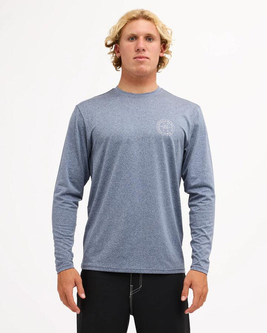 Image of a model wearing Tops. Product name - Billabong Mens Big Wave Daz Long Sleeve Rash Vest Navy Heather in Navy Heather colour by brand - Billabong