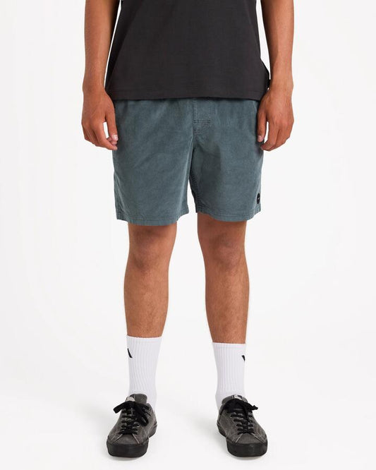 Image of a model wearing Shorts. Product name - Rvca Mens Escape Elastic Cord 17" Elastic Waist Shorts Balsam Green in Balsam Green colour by brand - Rvca
