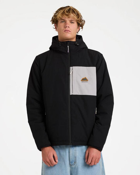 Image of a model wearing Outerwear. Product name - Billabong Mens Journey Adiv Puffer Jacket Black in Black colour by brand - Billabong