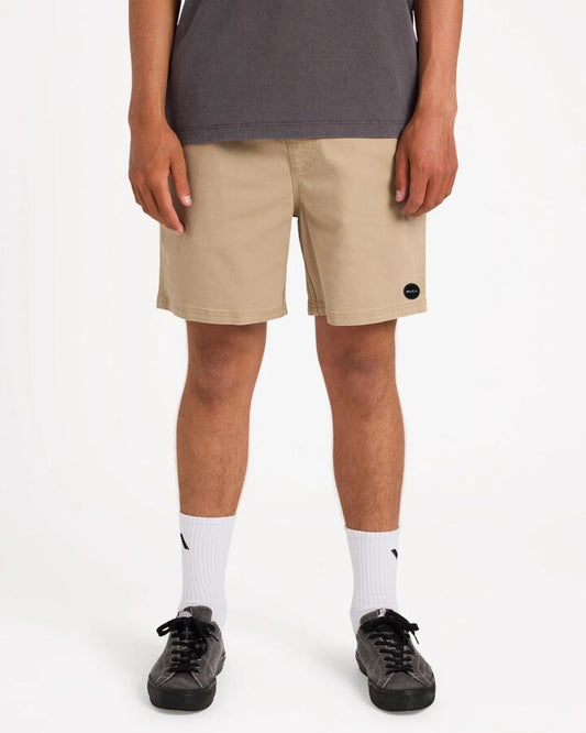 Image of a model wearing Shorts. Product name - Rvca Mens Escape 17" Elastic Waist Shorts Timber in Timber colour by brand - Rvca