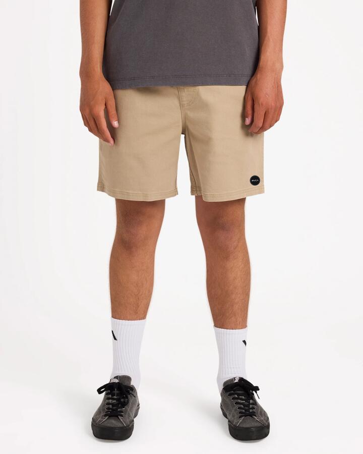 Image of a model wearing Shorts. Product name - Rvca Mens Escape Shorts Timber in Timber colour by brand - Rvca