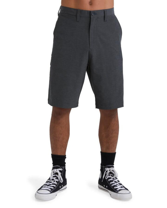 Image of a model wearing Shorts. Product name - Billabong Mens Crossfire Walkshorts Asphalt in Asphalt colour by brand - Billabong