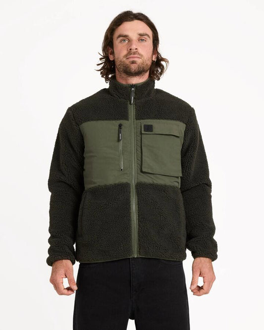 Image of a model wearing Outerwear. Product name - Volcom Mens Storm Stone Fleece Jacket Rinsed Black in Rinsed Black colour by brand - Volcom