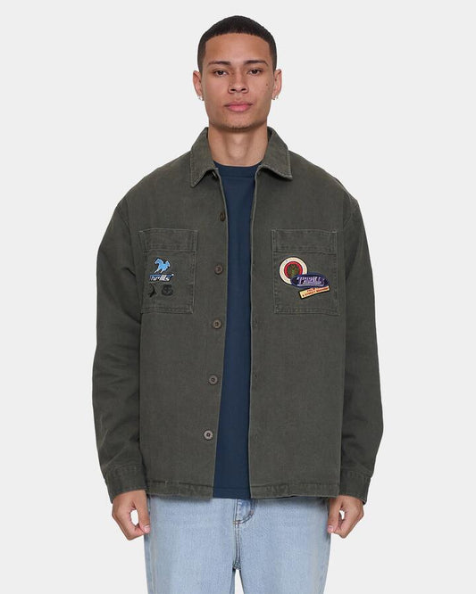 Image of a model wearing Outerwear. Product name - Thrills Mens Against All Odds Cropped Overshirt Casual Jacket Oil Green in Oil Green colour by brand - Thrills