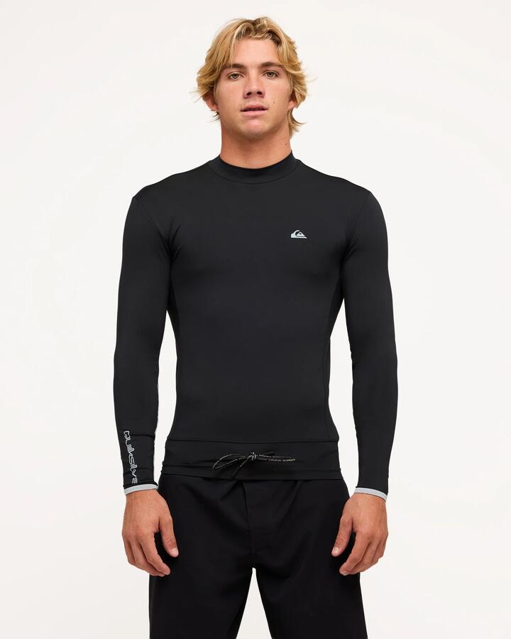 Image of a model wearing Tops. Product name - Quiksilver Mens Highline Upf50 Long Sleeve Rashguard Black in Black colour by brand - Quiksilver