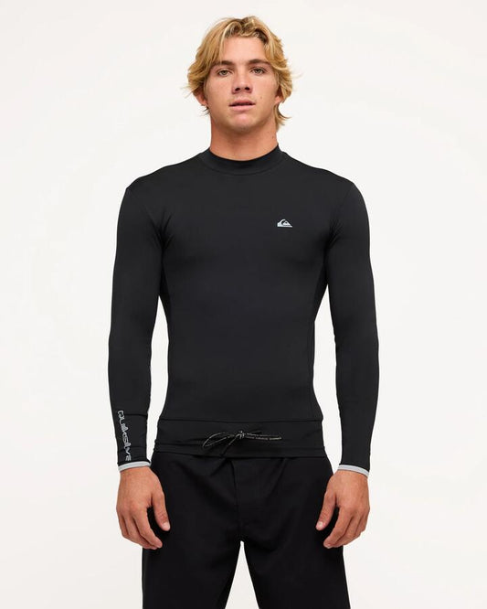 Image of a model wearing Tops. Product name - Quiksilver Mens Highline Upf50 Long Sleeve Rashguard Black in Black colour by brand - Quiksilver