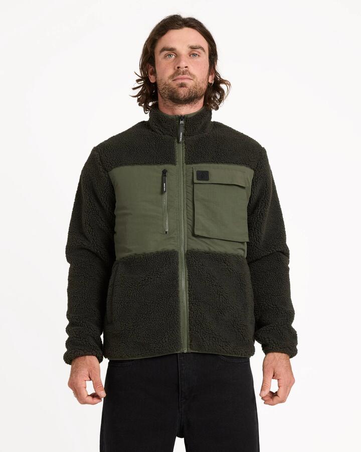 Image of a model wearing Outerwear. Product name - Volcom Mens Storm Stone Fleece Jacket Rinsed Black in Rinsed Black colour by brand - Volcom