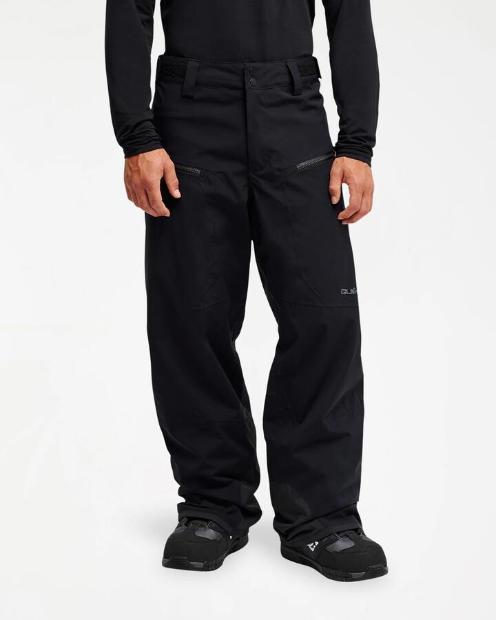 Image of a model wearing Pants. Product name - Quiksilver Mens Paramo Stretch 20K Snow Pants Black in Black colour by brand - Quiksilver