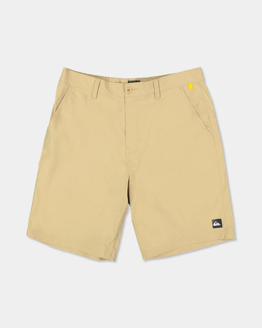 Image of a model wearing Shorts. Product name - Quiksilver Mens Overcast Amphibian 20" Hybrid Shorts Cornstalk in Cornstalk colour by brand - Quiksilver