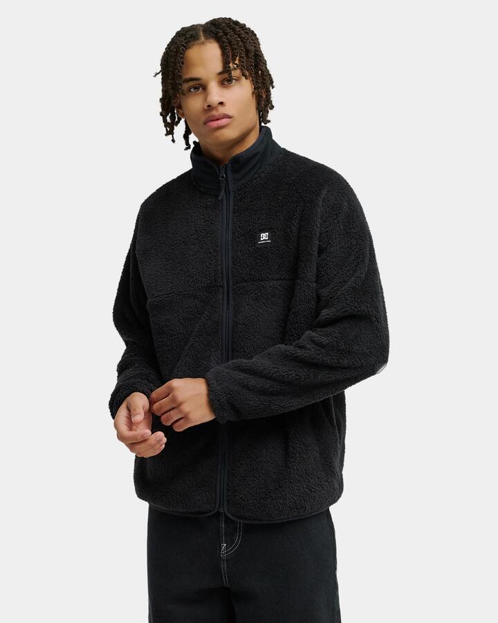 Image of a model wearing Outerwear. Product name - DC Shoes Mens Lynx Fleece Jacket Anthracite in Anthracite colour by brand - DC Shoes